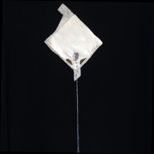 55.Sad_8in X 33in_laser-print_glass beads_batting_threads_floss_acrylic on vintage linen hankie_2016